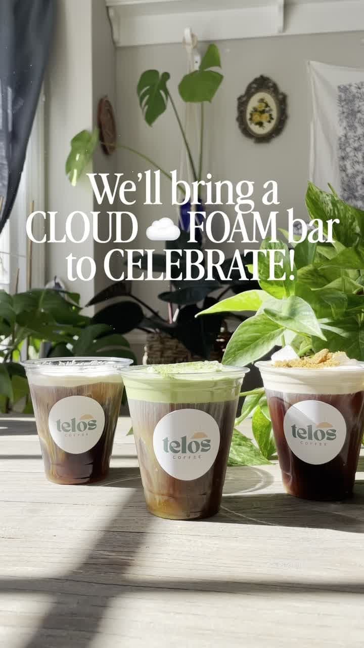 Three branded Telos cups being finished with cloud foam by a sunlit window