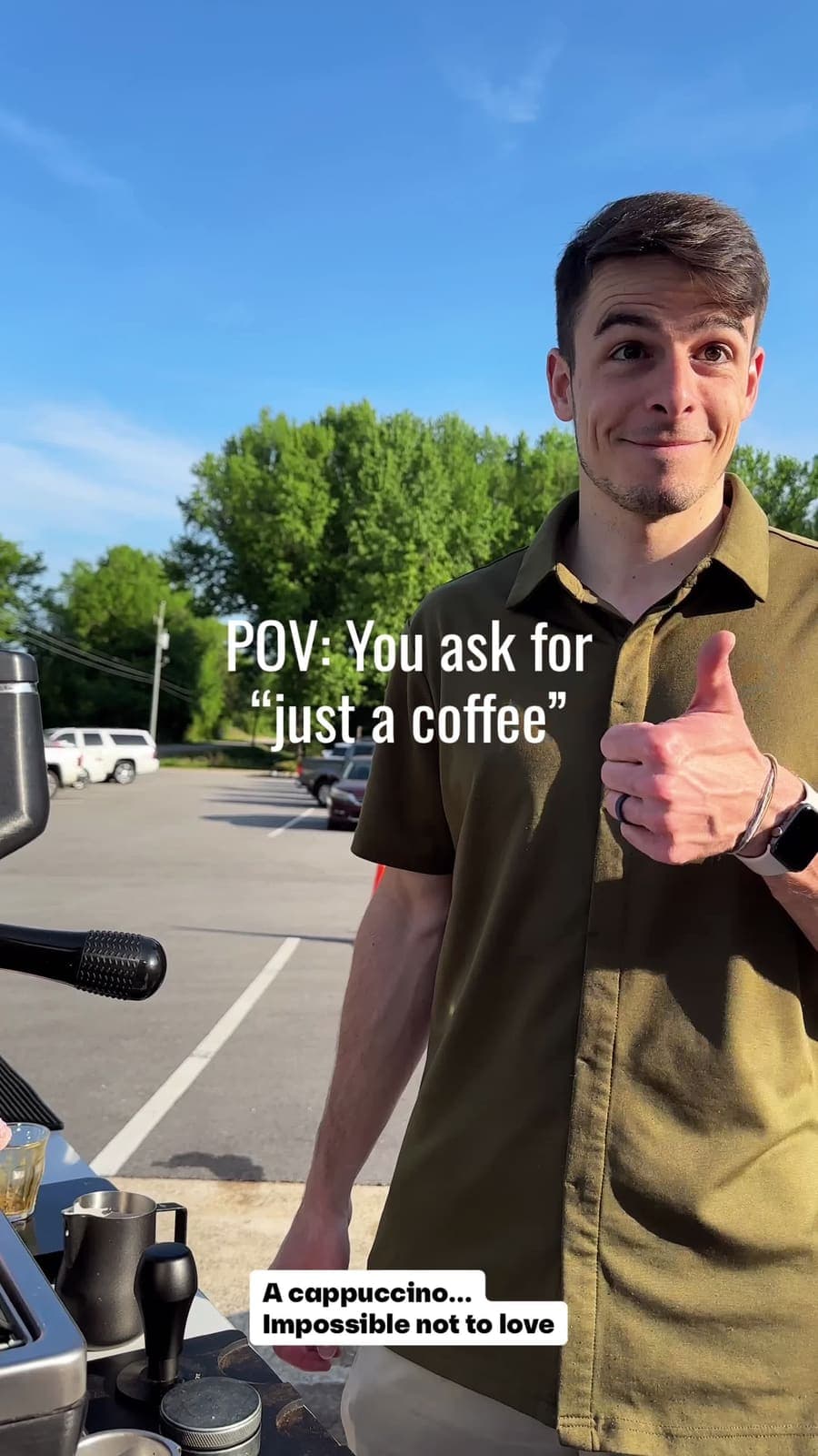 Tim grinning with a thumbs up beside the espresso machine, from a reel about what goes into every drink